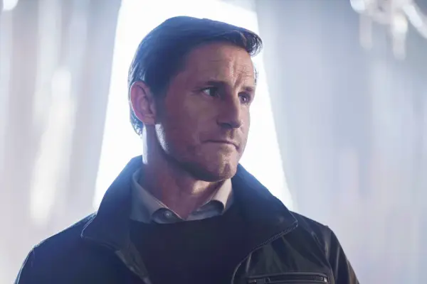 Close up of Sam Jaeger as Mark Tuello