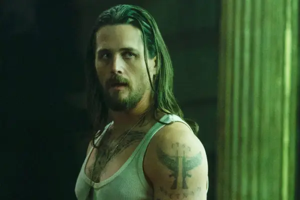 Frankie stood up wearing a white vest