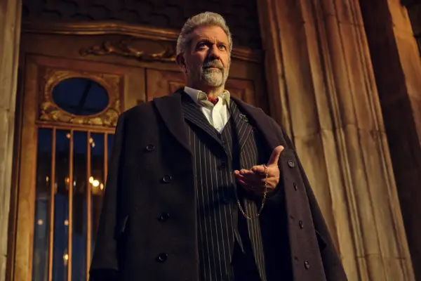 Cormac stood with his hand outstretched, holding a pocket watch