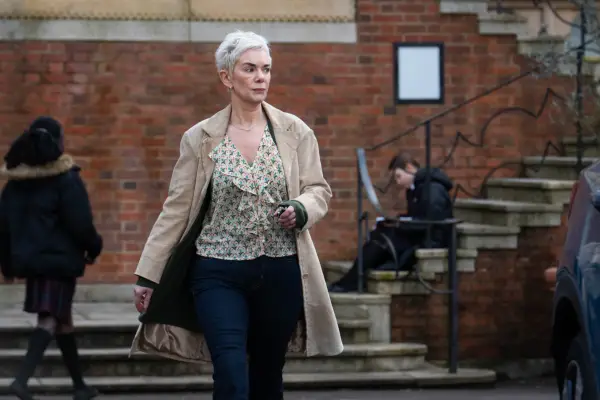 Victoria Hamilton as Juliet Cooper in Unforgotten season 6 walking quickly through a car park.