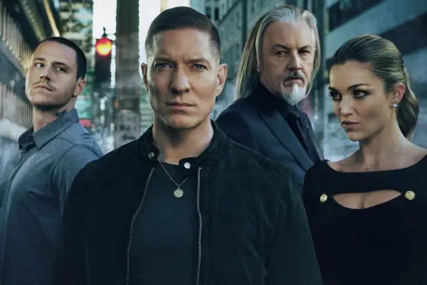 The cast of Power Book IV: Force season 2 gathered together outside, looking serious