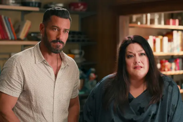 Ronnie and dana Sue stood next to one another in their home