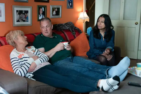 Harvey talks to Jean as Maya watches on in EastEnders