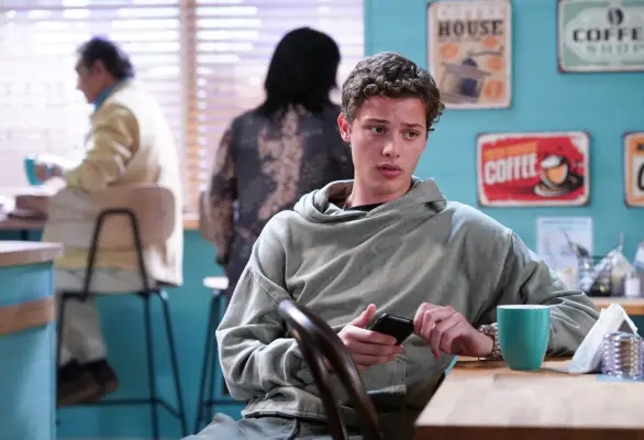 Bobby Brazier as Freddie Slater sat in Kathy