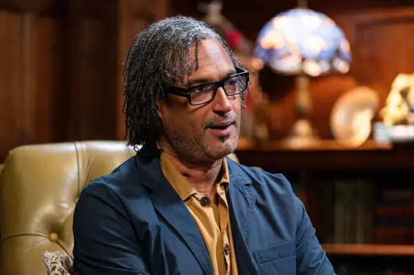 A close up head shot of Davod Olusoga speaking whilst on set of The Celebrity Traitors.