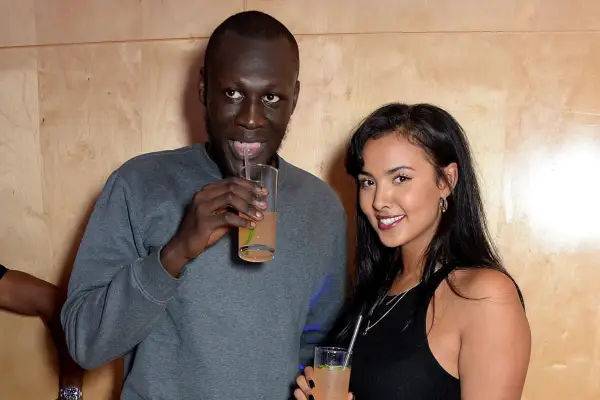 Stormzy and Maya Jama attending the Rinse FM 20th Birthday Anniversary Dinner at St Martins Lane Hotel on December 22, 2014 in London, England.