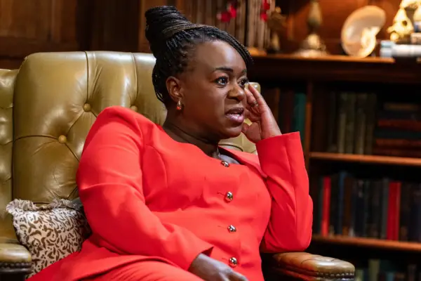 Tameka Empson wearing an all red outfit, looking ahead.