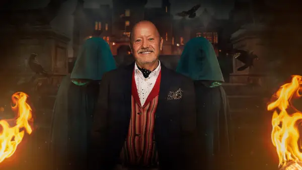 Aubrey for The Traitors season 2. Aubrey is wearing a suit and smiling