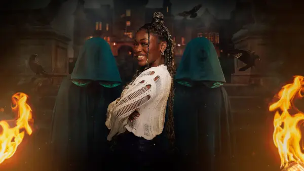 Jasmine for The Traitors season 2. Jasmine is wearing a white jumper with her back turned.