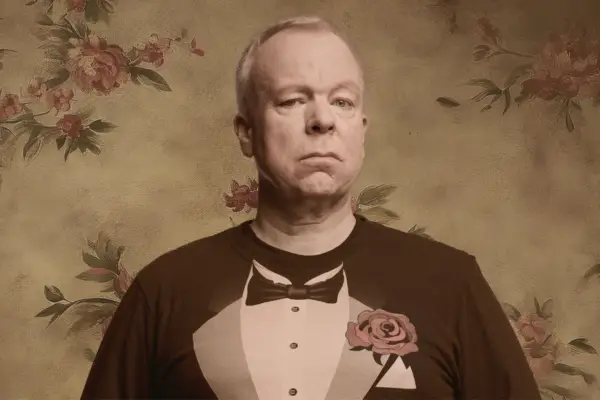 Steve Pemberton in a t-shirt that is styled like a tuxedo.