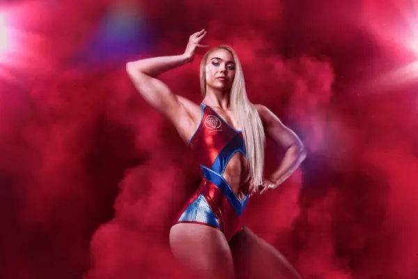 Diamond for the Gladiators. She is doing the crown pose with red smoke around her