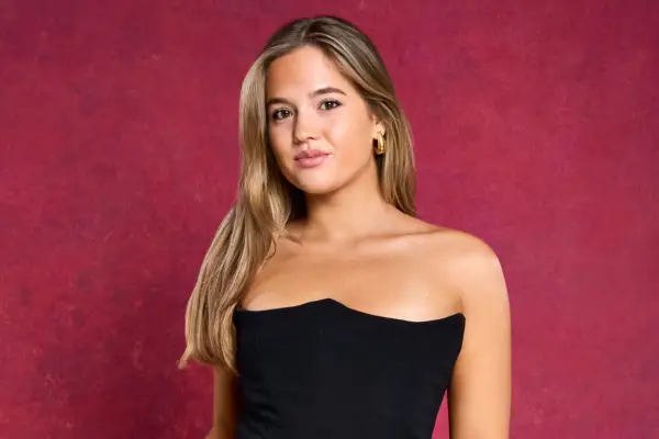 A woman wearing a matching grey two-piece set.