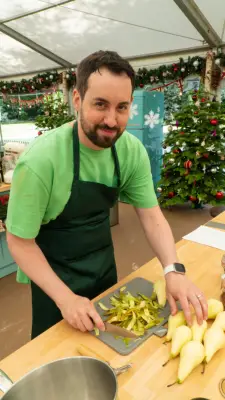 Dan wearing a lime green t-shirt and green apron
