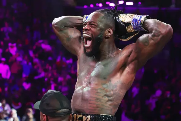 Deontay Wilder celebrates a heavyweight boxing victory