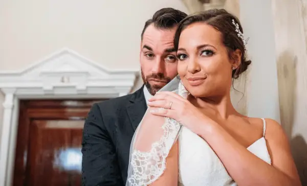 Shona stood up and kissing Matt on the side of the head with her arm stretched around his shoulder.