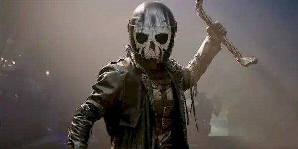 Still of Mr. Grimm raising up a piece of twisted metal like a weapon