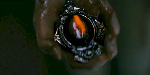 Still of a bloody necklace in The Curse of the Necklace