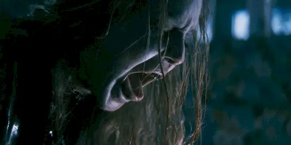 Still of someone possessed in The Curse of the Necklace