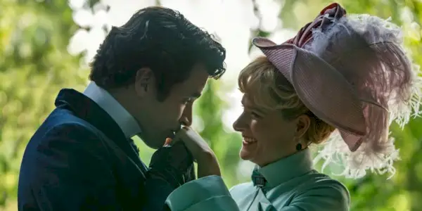 Harry Richardson as Larry Russell kissing the left hand of Louisa Jacobson as Marian Brook in The Gilded Age
