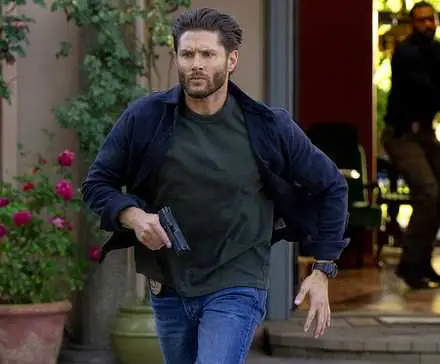 Jensen Ackles as Mark Meachum running with a gun in a still from Countdown Episode 6
