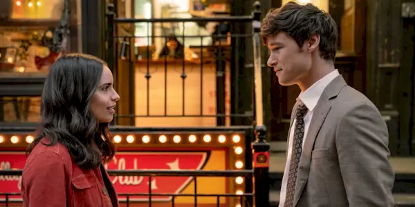 Sofia Carson as Alex Rose standing across from and talking to Kyle Allen as Brad in The Life List