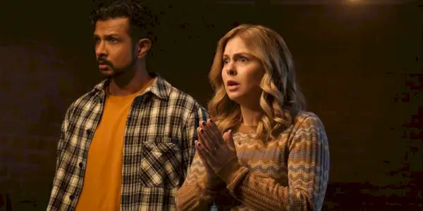 Jay (Utkarsh Ambudkar) and Sam (Rose McIver) stand in shock in Season 4 of 