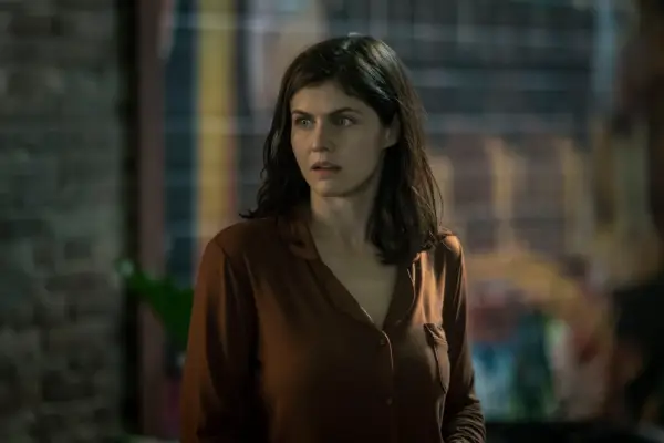 Alexandra Daddario in Mayfair Witches wearing a brown shirt