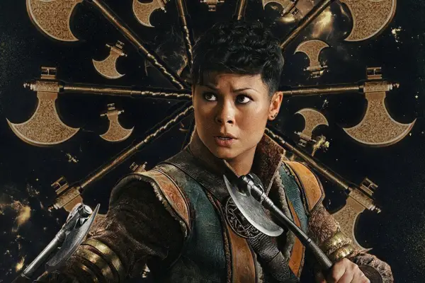 Anna Leong Brophy in Shadow and Bone holding an axe