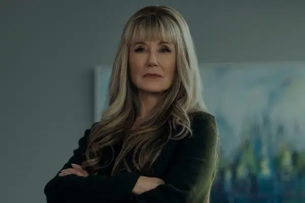 Mary McDonnell as Madeline Usher in The Fall of the House of Usher with her arms folded