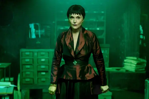 Miranda Richardson as Shax in Good Omens season 2 wearing a dark red dress