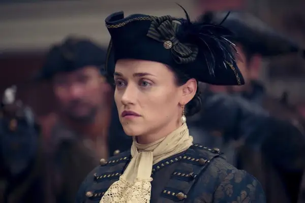 Alice Kremelberg as Sofia Wilmot in Renegade Nell wearing a formal black outfit