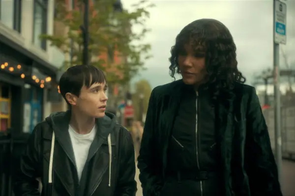 The Umbrella Academy. (L to R) Elliot Page as Viktor Hargreeves, Emmy Raver-Lampman as Allison Hargreeves in The Umbrella Academy. Cr. Courtesy of Netflix © 2022