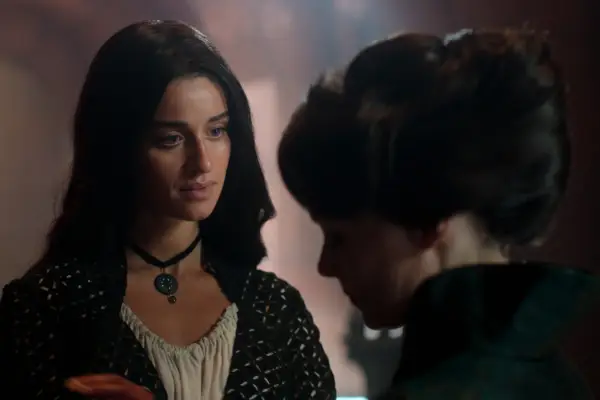 Anya Chalotra in The Witcher season 3, looking at Tissaia