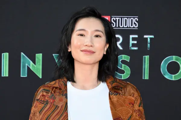 Meng’er Zhang in an orange shirt