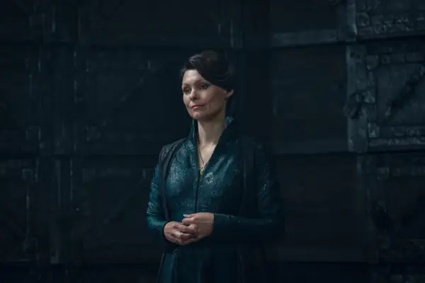 MyAnna Buring in The Witcher, with her hands clasped