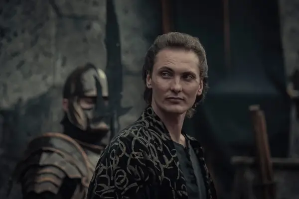 Eamon Farren in The Witcher, smirking