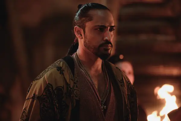 Mahesh Jadu in The Witcher, wearing a yellow robe