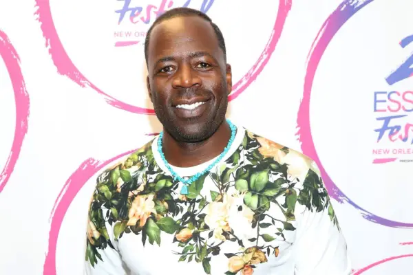 Demetrius Grosse poses backstage during the 2019 ESSENCE Festival