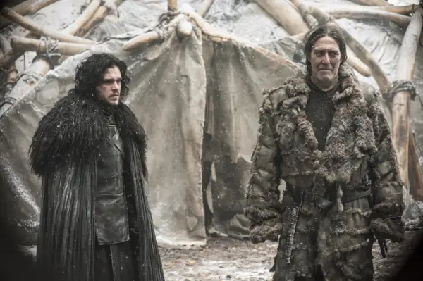 Jon Snow with Tormund Giantsbane in Game of Thrones season 4 standing in winter attire