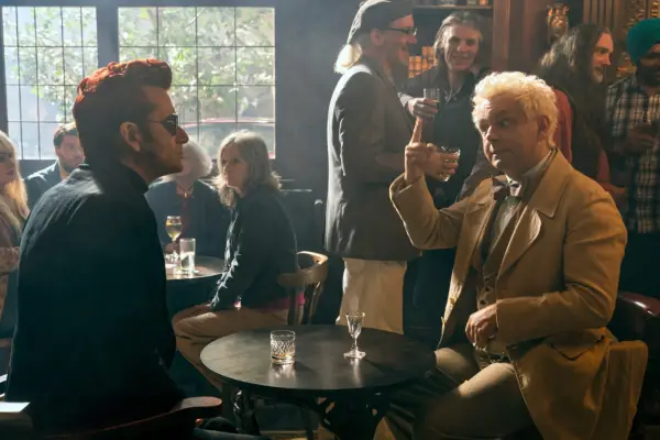 David Tennant and Michael Sheen in The Good Omens season 2 sat in a pub