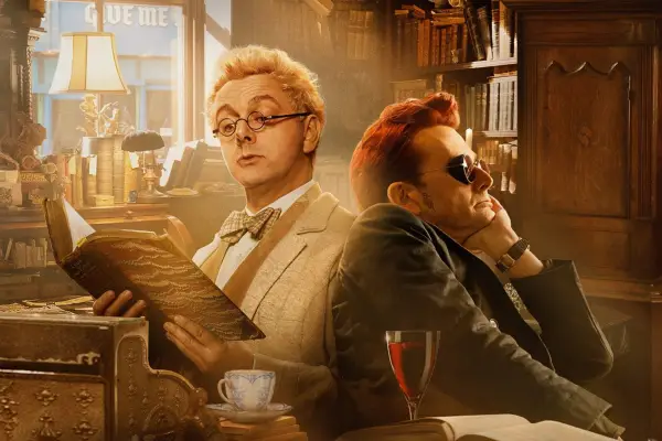 David Tennant and Michael Sheen in Good Omens season 2, sitting back-to-back