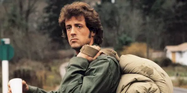 John Rambo (Sylvester Stallone) with a bag over his shoulder in 