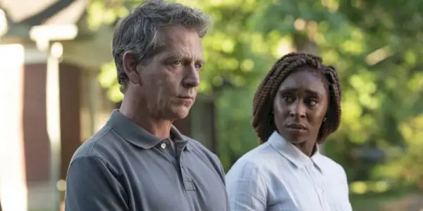 Cynthia Erivo looking at a pensive Ben Mendelsohn in The Outsider.