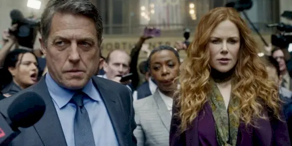 Hugh Grant and Nicole Kidman surrounded by the press in The Undoing