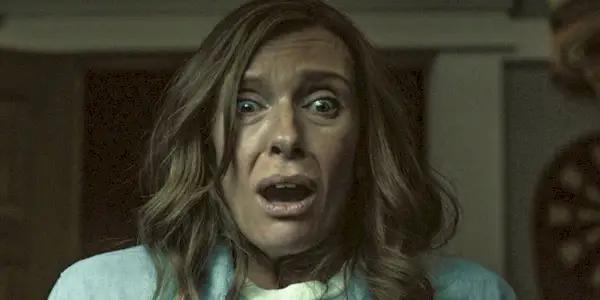 Annie staring in horror in Hereditary 