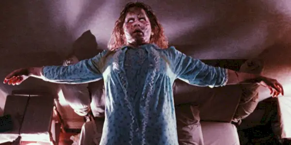 Linda Blair as Regan floating over her bed in The Exorcist 