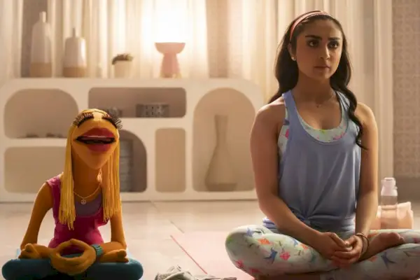 Saara Chaudry as Hannah and Janice, the singer/lead guitarist of the Electric Mayhem Band, in The Muppets Mayhem