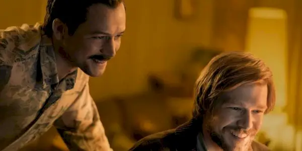 Taron Egerton as Henk Rogers with Nikita Efremov as Aleksei Pajitnov in Tetris