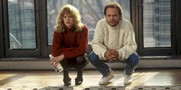 Sally and Harry from When Harry Met Sally sitting together in an empty apartment