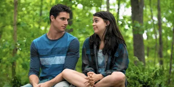 Bianca and Wesley talking in the woods in The DUFF